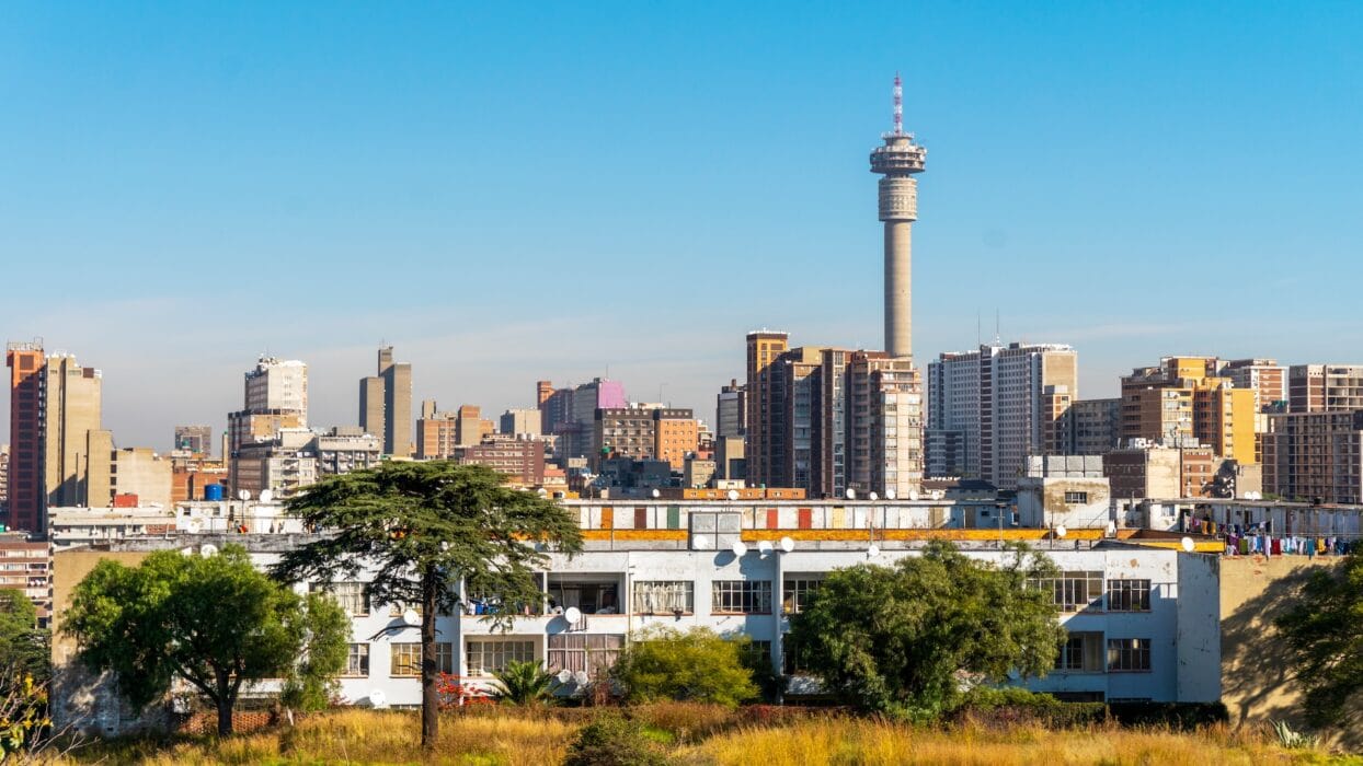 Johannesburg city skyline at sunset showcasing modern buildings and vibrant city life