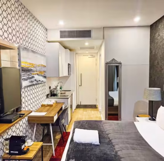 Stylish bedroom in luxury Sandton apartment